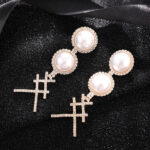 Elegance in Motion Rhinestone Pearl Earrings